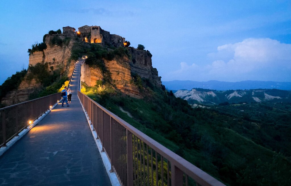 View of Civita di Bagnoregio at dusk from the pedestrian bridge
